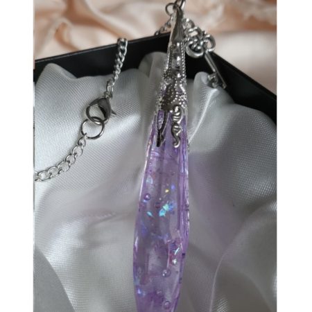 Purple shimmering potion themed crystal pendant necklace