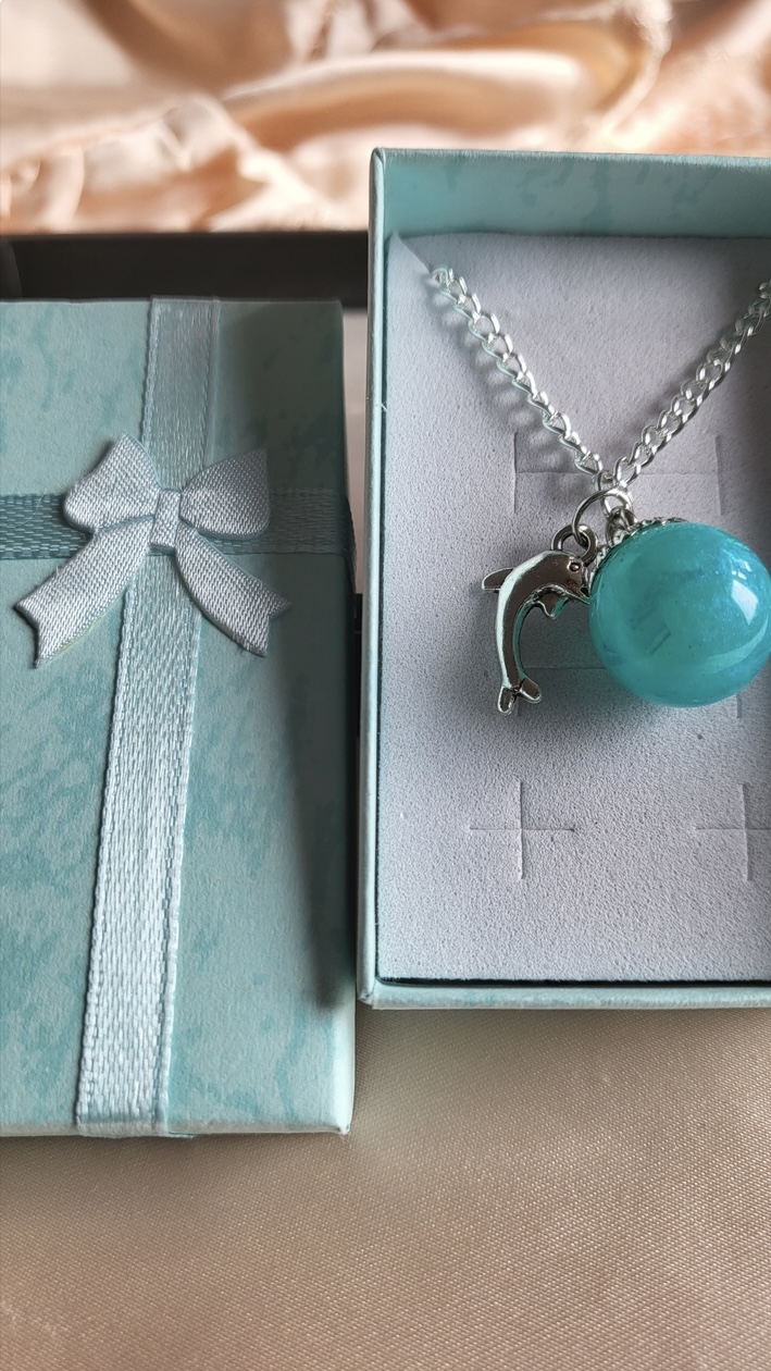 Ocean blue themed resin ball necklace