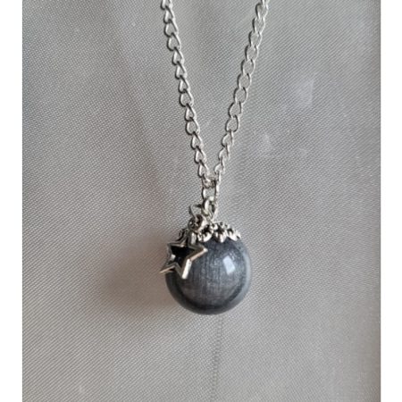 Silver moon themed resin ball necklace