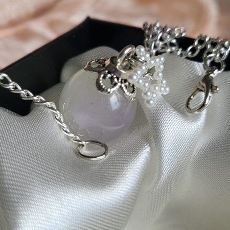 Pearlescent star themed resin ball necklace