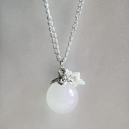 Pearlescent star themed resin ball necklace