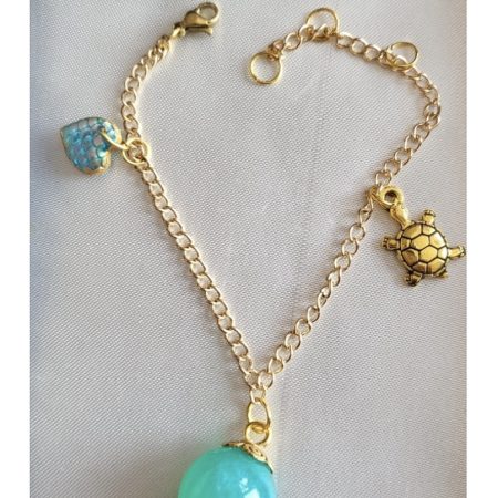 Shimmering aqua mermaid themed resin ball bracelet