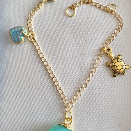 Shimmering aqua mermaid themed resin ball bracelet