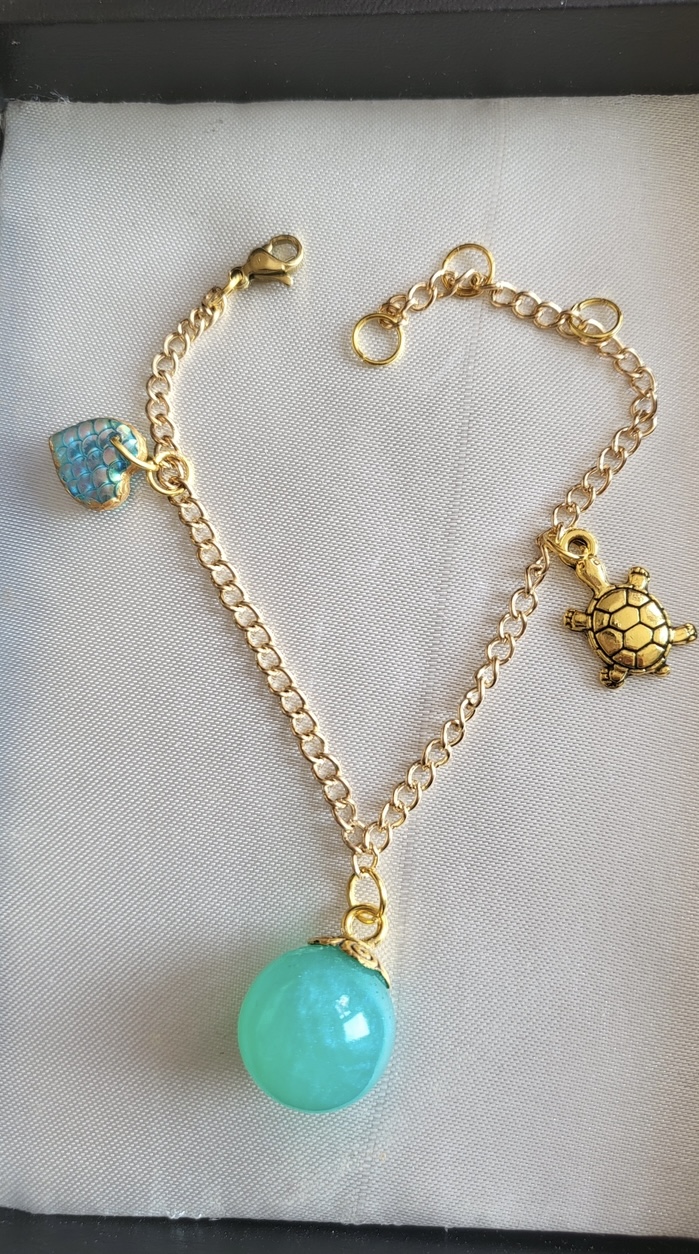 Shimmering aqua mermaid themed resin ball bracelet