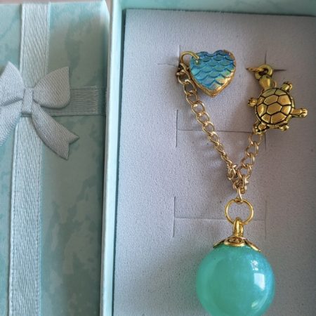 Shimmering aqua mermaid themed resin ball bracelet