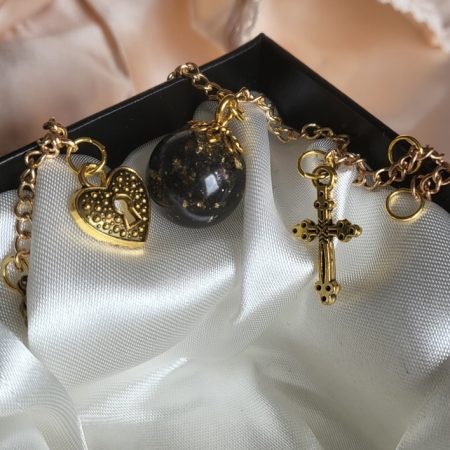 Fancy black and gold resin ball bracelet