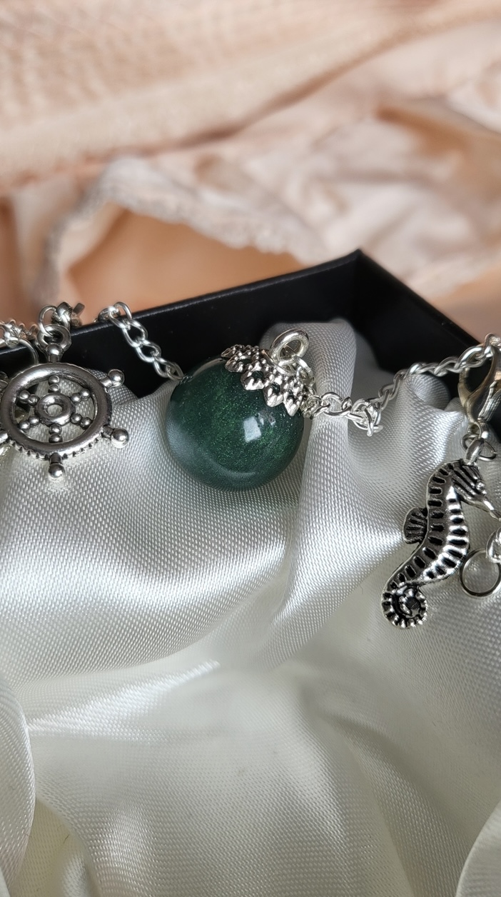 Dark siren green, siren themed resin ball bracelet