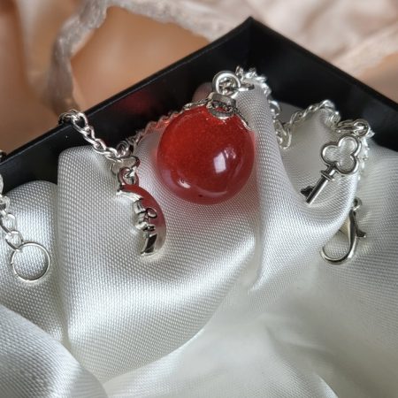 Ruby red, spooky themed resin ball bracelet