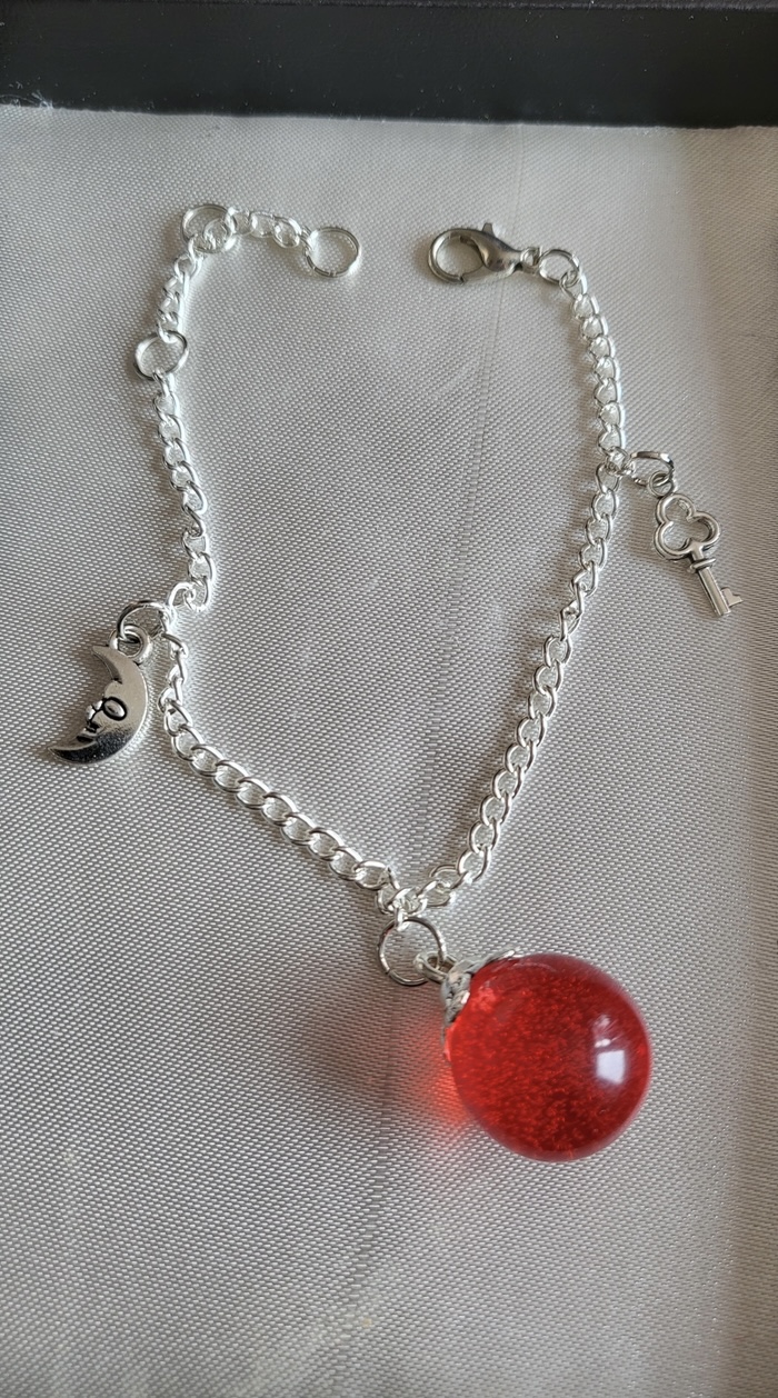 Ruby red, spooky themed resin ball bracelet