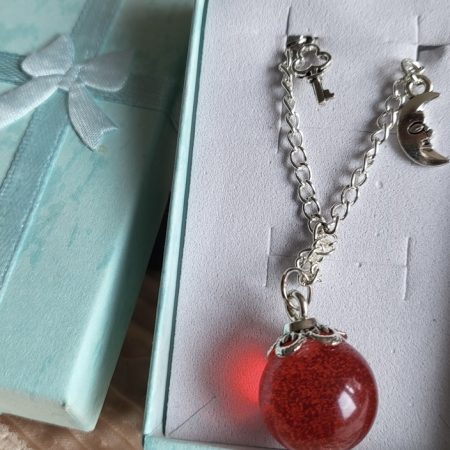 Ruby red, spooky themed resin ball bracelet