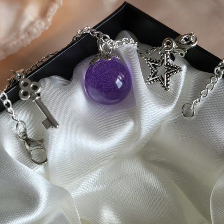 Purple galaxy themed resin ball bracelet