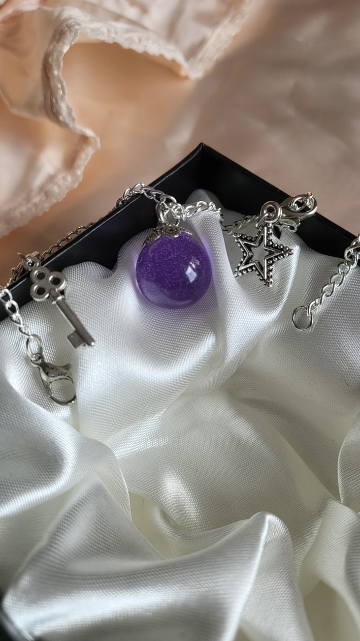 Purple galaxy themed resin ball bracelet
