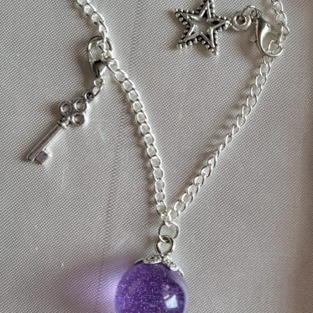 Purple galaxy themed resin ball bracelet