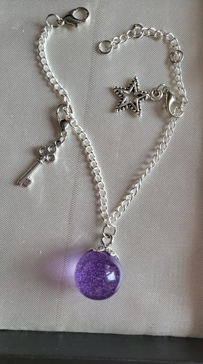 Purple galaxy themed resin ball bracelet