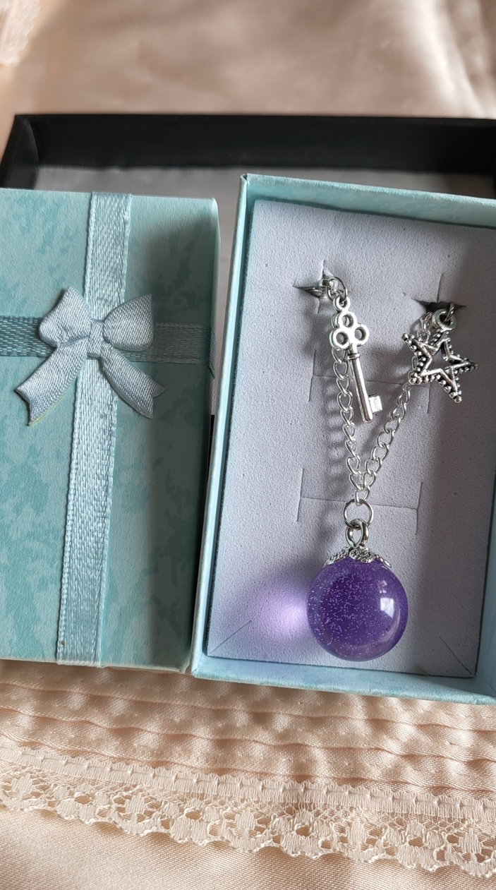 Purple galaxy themed resin ball bracelet