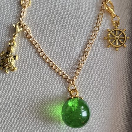Emerald green ocean themed resin ball Bracelet