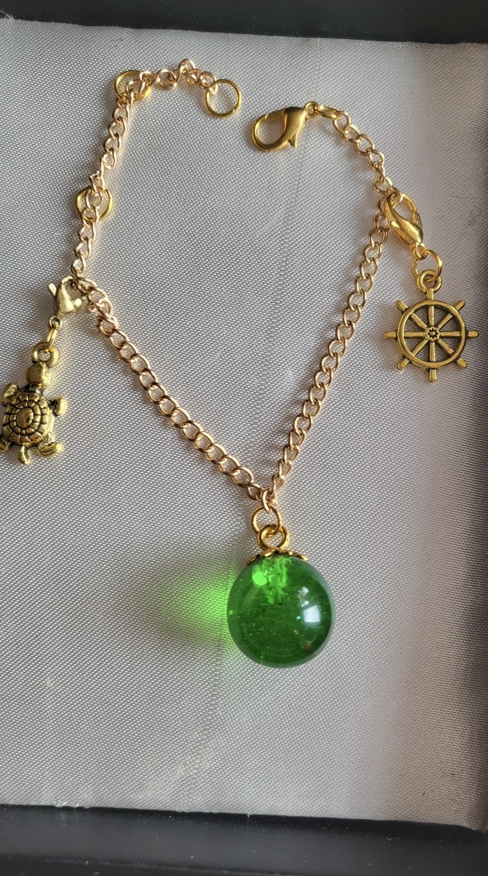 Emerald green ocean themed resin ball Bracelet