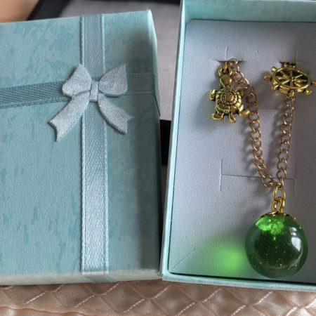 Emerald green ocean themed resin ball Bracelet