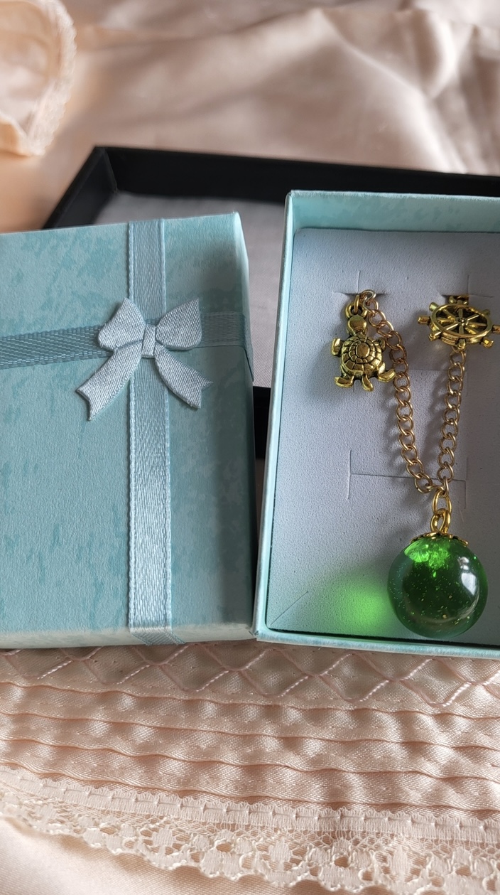 Emerald green ocean themed resin ball Bracelet