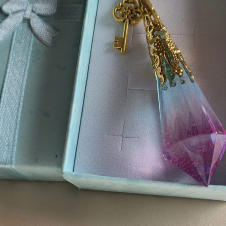 Beautiful pink and blue fantasy themed resin Crystal pendant necklace