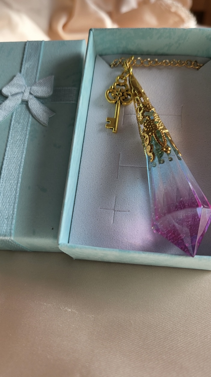 Beautiful pink and blue fantasy themed resin Crystal pendant necklace