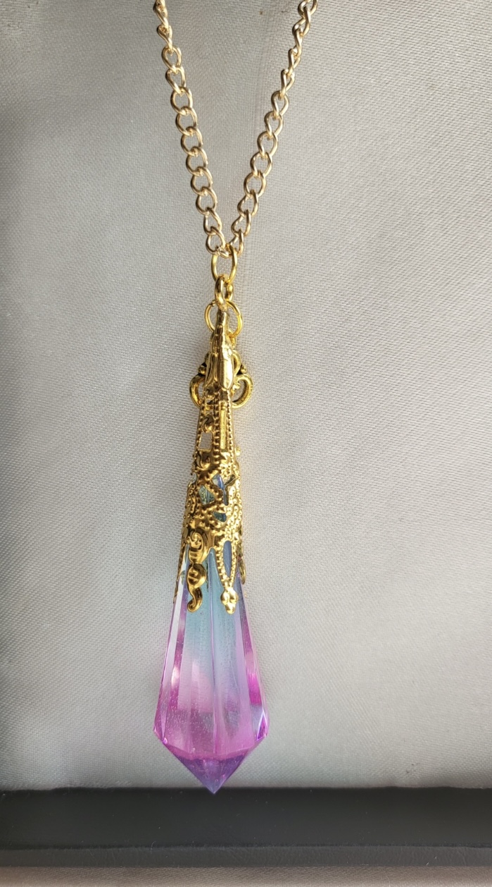 Beautiful pink and blue fantasy themed resin Crystal pendant necklace