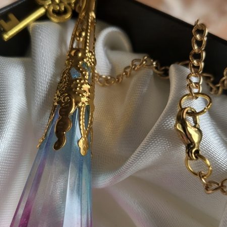 Beautiful pink and blue fantasy themed resin Crystal pendant necklace