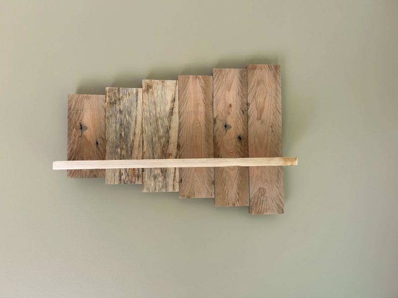 Rustic wood shelf made from reclaimed pallet wood