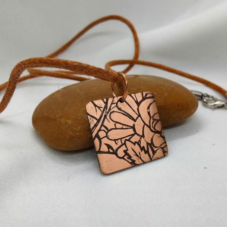 Handcrafted Copper Pendant with Floral Engraving