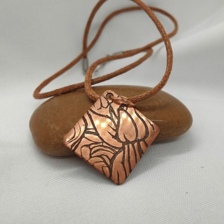 Handcrafted Copper Pendant with Floral Engraving