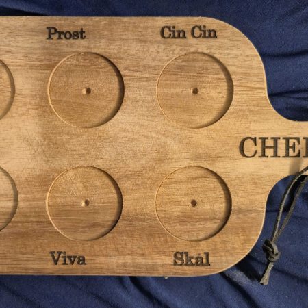 "Cheers" wooden shot glass paddle.