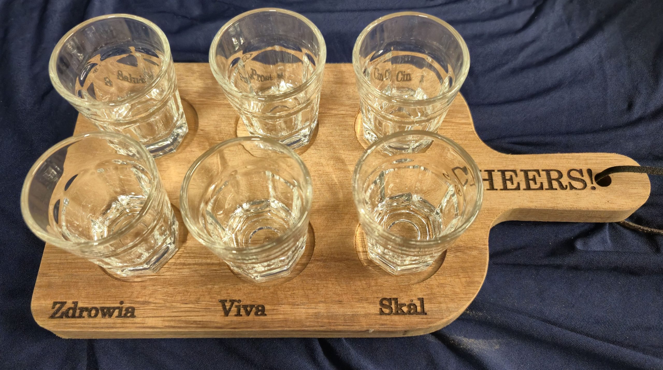 "Cheers" wooden shot glass paddle.