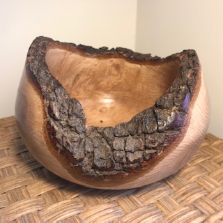 Natural edge Holme Oak hand turned bowl.