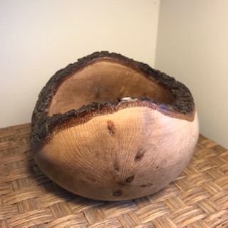 Natural edge Holme Oak hand turned bowl.