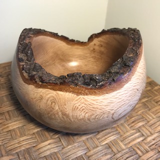 Natural edge Holme Oak hand turned bowl.