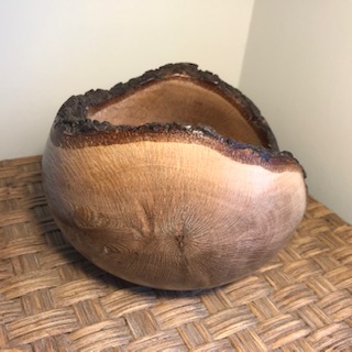 Natural edge Holme Oak hand turned bowl.