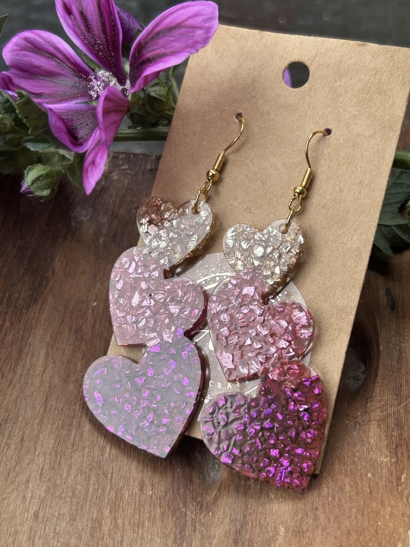 Three hearts resin earrings with broken glass