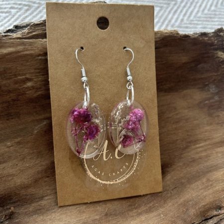 Resin oval earrings with dry flowers