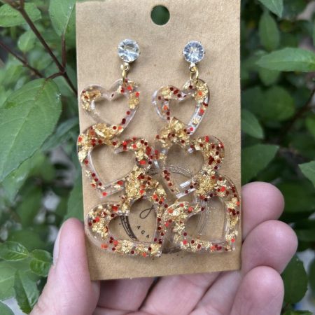 Three hearts stud earrings with gold