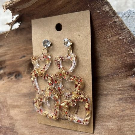 Three hearts stud earrings with gold