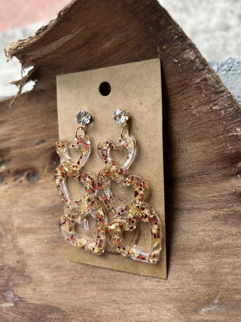 Three hearts stud earrings with gold