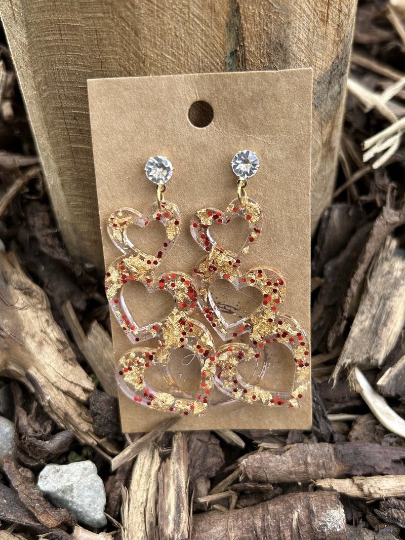 Three hearts stud earrings with gold