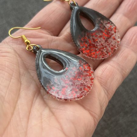 Large teardrop resin earrings with red sparkles