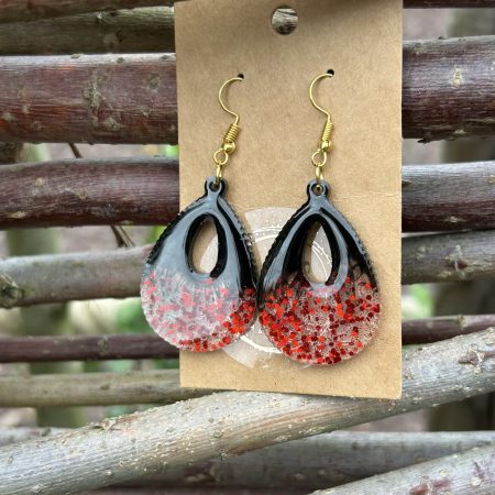 Large teardrop resin earrings with red sparkles