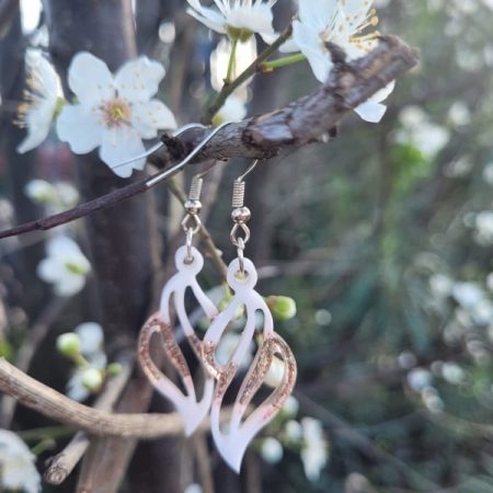 Resin earrings with white pigment and red glitter