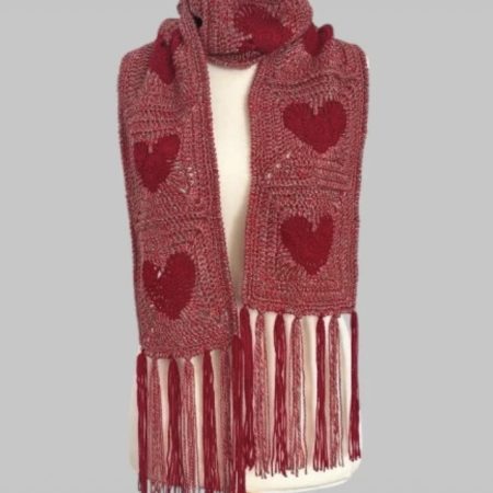Heart shape crochet unisex scarf with tassels. Various shades of red. Size 64” x 6.5”. Handmade.