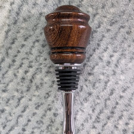 Hand turned bottle stopper made from panga panga wood
