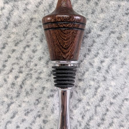 Hand turned bottle stopper made from panga panga wood