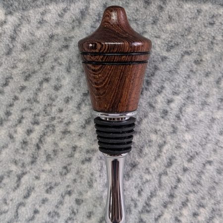 Hand turned bottle stopper made from panga panga wood