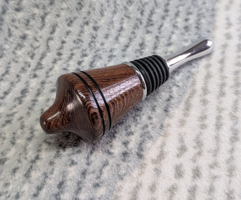 Hand turned bottle stopper made from panga panga wood